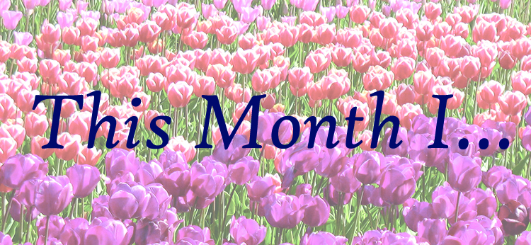 Red and pink tulip photograph with text 'This Month I...' on top in dark blue cursive